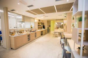 Η κουζίνα ή μικρή κουζίνα στο Garni Hotel D10
