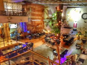 an overhead view of a restaurant with tables and chairs at Allamanda Hotel in Port-au-Prince