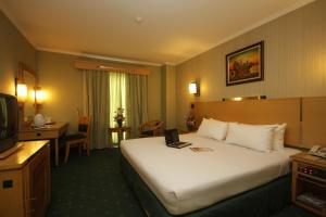 Letto o letti in una camera di Hotel Kaisar