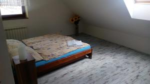 Postel nebo postele na pokoji v ubytování Apartment Železný Hrozen