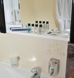 Ванна кімната в Kontinent Hotel