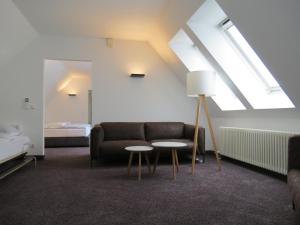 Postel nebo postele na pokoji v ubytování Comfor Hotel Ulm City