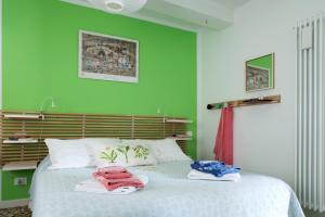 Postel nebo postele na pokoji v ubytování Aria e Luce Suites a Venezia