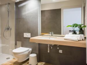 Kúpeľňa v ubytovaní VacationClub - Przy Plaży Apartment 23 + 14 fotografií