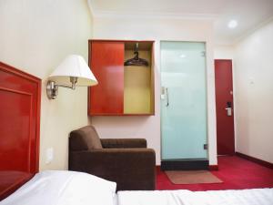 Postel nebo postele na pokoji v ubytování Sun Inns Hotel Subang