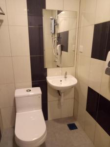 Koupelna v ubytování Hotel Sri Bernam