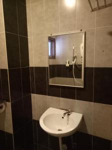 Koupelna v ubytování Hotel Sri Bernam
