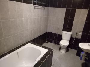 Koupelna v ubytování Hotel Sri Bernam