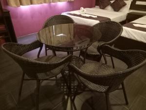 Postel nebo postele na pokoji v ubytování Hotel Sri Bernam