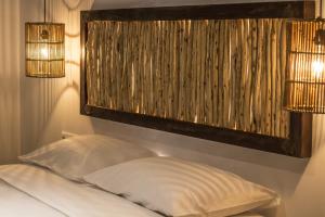 Posteľ alebo postele v izbe v ubytovaní Eternal Suites