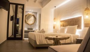 Posteľ alebo postele v izbe v ubytovaní Eternal Suites