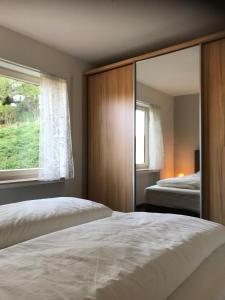 Giường trong phòng chung tại Haus Schöne Aussicht - Winterberg/Niedersfeld