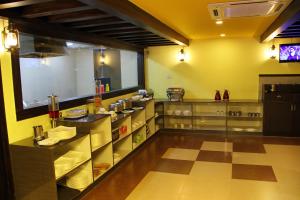 Restaurace v ubytování Vinayaga by Poppys ,Kumbakonam