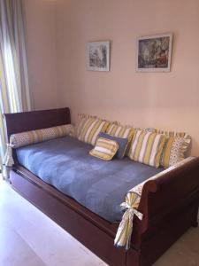 A bed or beds in a room at Conjunto Altos de Vista Nevada,nº11,portal 7,1ºA.