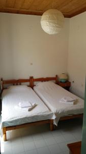 Tempat tidur dalam kamar di Albatros