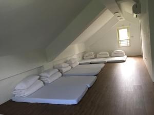 Postel nebo postele na pokoji v ubytování Fanny Manor B&B