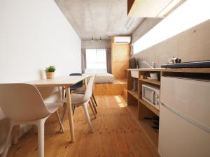 A kitchen or kitchenette at Smi:re Stay Oshiage