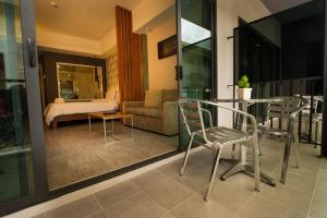 Posezení v ubytování Inn Residence Serviced Suites - SHA Extra Plus