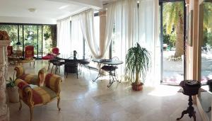 Posezení v ubytování Le due palme Bed & Breakfast
