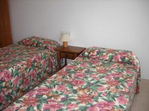 A bed or beds in a room at Eagle 2
