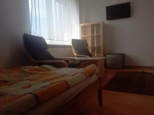 TV a/nebo společenská místnost v ubytování Dom Gościnny Cuma