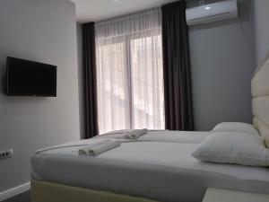Voodi või voodid majutusasutuse Guesthouse Montex toas