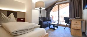 Posteľ alebo postele v izbe v ubytovaní Hotel Gasthof Höllriegl