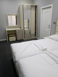 Voodi või voodid majutusasutuse Guesthouse Montex toas