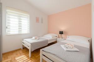 Posteľ alebo postele v izbe v ubytovaní Apartment Sun & Sea
