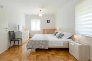 Posteľ alebo postele v izbe v ubytovaní Apartment Sun & Sea