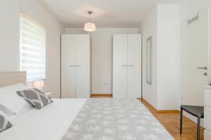 Posteľ alebo postele v izbe v ubytovaní Apartment Sun & Sea