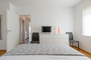 Posteľ alebo postele v izbe v ubytovaní Apartment Sun & Sea