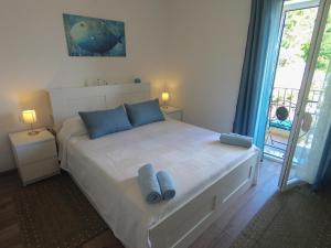Posteľ alebo postele v izbe v ubytovaní Apartment Antunovic + 22 fotografií