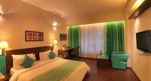 Postelja oz. postelje v sobi nastanitve Hotel Sewa Grand Faridabad