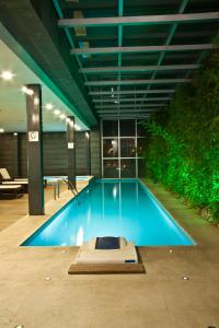 Bazén v ubytování Casa Inn Premium Hotel Queretaro nebo v jeho okolí