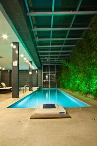 Bazén v ubytování Casa Inn Premium Hotel Queretaro nebo v jeho okolí