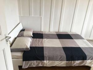 Cama o camas de una habitación en Hôtel-Restaurant de la Tour