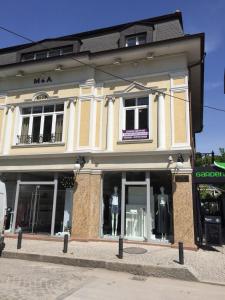 a store front of a building on a street at Студия Давидов "Studios Davidoff"- апартаменти под наем in Plovdiv