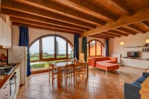 A kitchen or kitchenette at Residence Corte Ferrari -Ciao Vacanze-