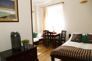 Posezení v ubytování 4 STRONY ŚWIATA Pokoje i Apartamenty