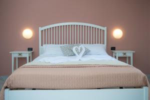 Cama ou camas em um quarto em Hotel San Giovanni