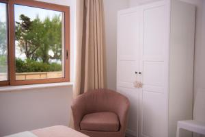 Cama ou camas em um quarto em Hotel San Giovanni