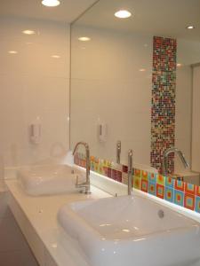Koupelna v ubytování O.U.M. Hotel - โรงแรมโอยูเอ็ม