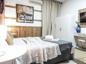 Postel nebo postele na pokoji v ubytování Magic Door Rome