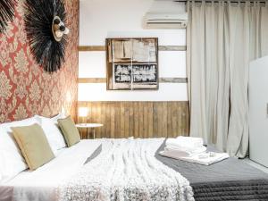 Postel nebo postele na pokoji v ubytování Magic Door Rome
