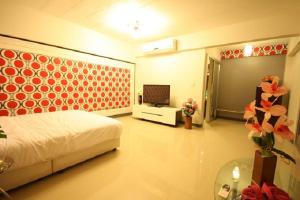 TV a/nebo společenská místnost v ubytování O.U.M. Hotel - โรงแรมโอยูเอ็ม