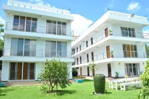 Zahrada ubytování O.U.M. Hotel - โรงแรมโอยูเอ็ม