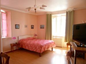 Postel nebo postele na pokoji v ubytování Hôtel Modern