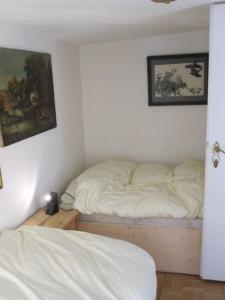 モンシャウにあるHaus Traditionのベッドルーム1室(ベッド2台付)