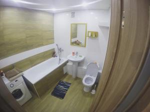 Ванна кімната в Apartment near Megacenter